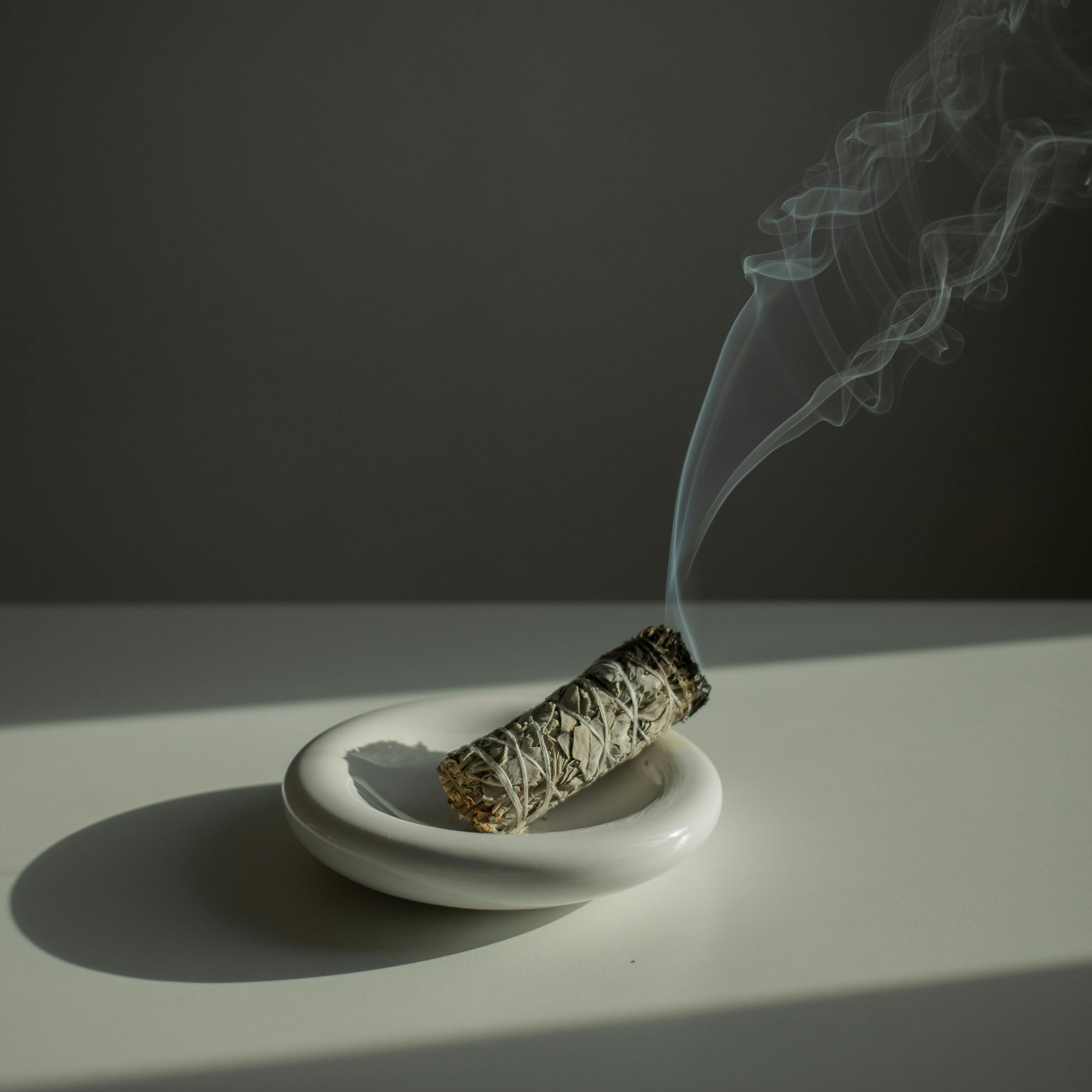 Sage smoke cleansing ritual to promote a calm, low-tox home.