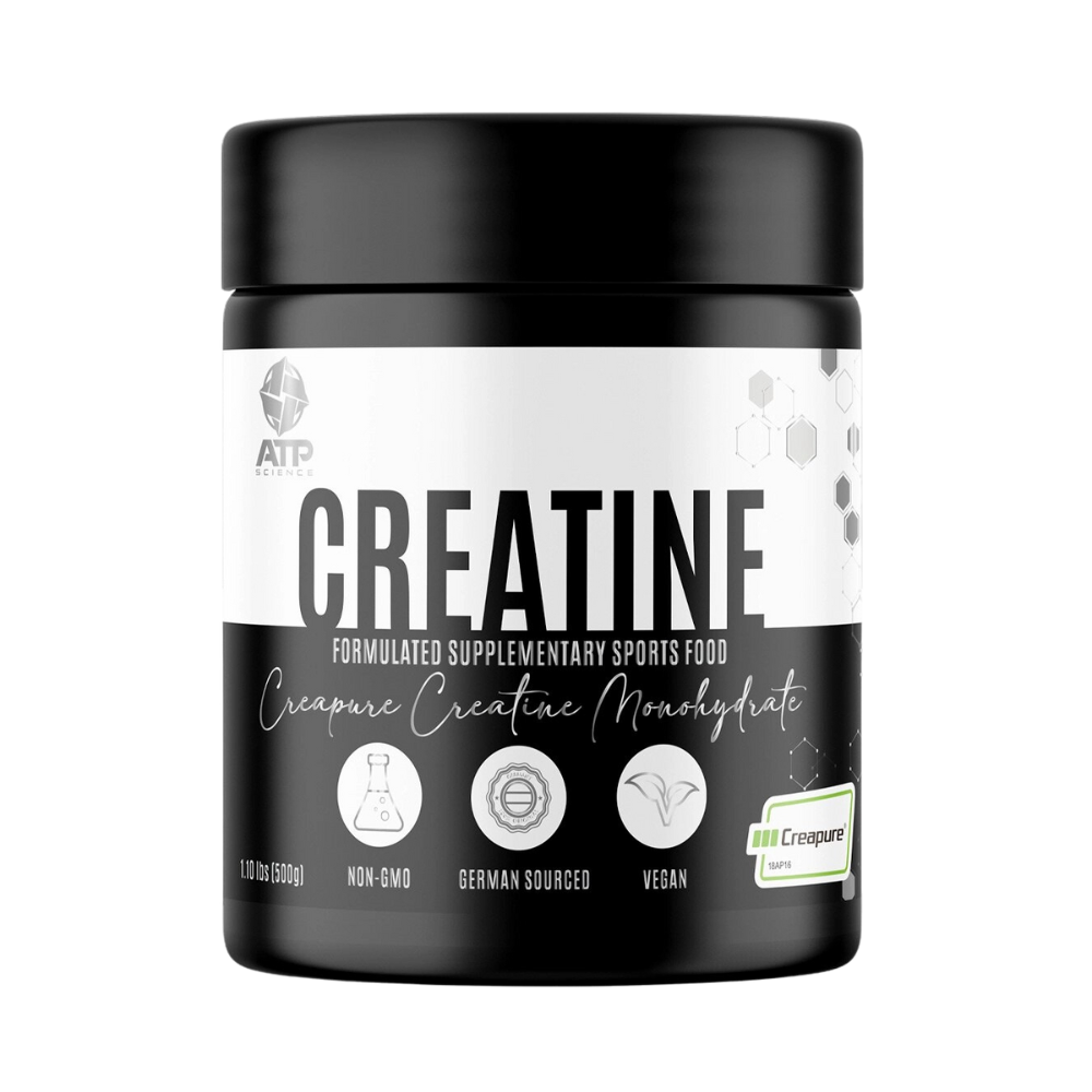 A container of ATP Science Creatine Monohydrate Creapure. The container is black with white and green text, indicating the product is vegan, non-GMO, and German sourced.