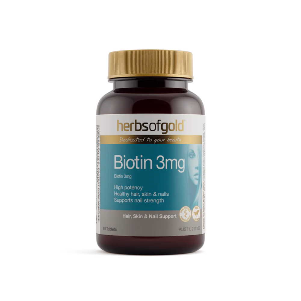 A bottle of Herbs of Gold Biotin 3mg, which is a dietary supplement intended for enhancing hair strength, healthy skin, and nail support.