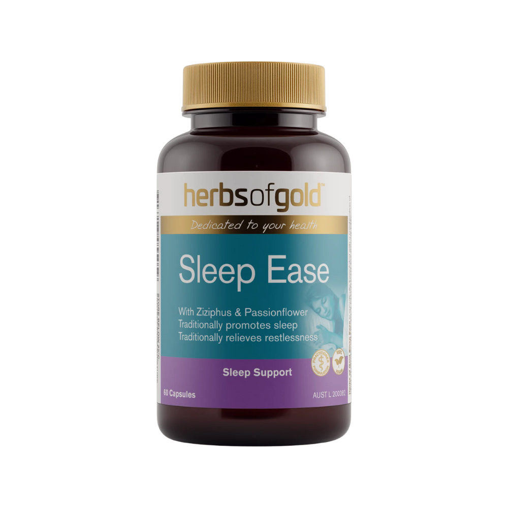 A bottle of Herbs of Gold Sleep Ease capsules, with a label indicating it is a sleep support supplement.