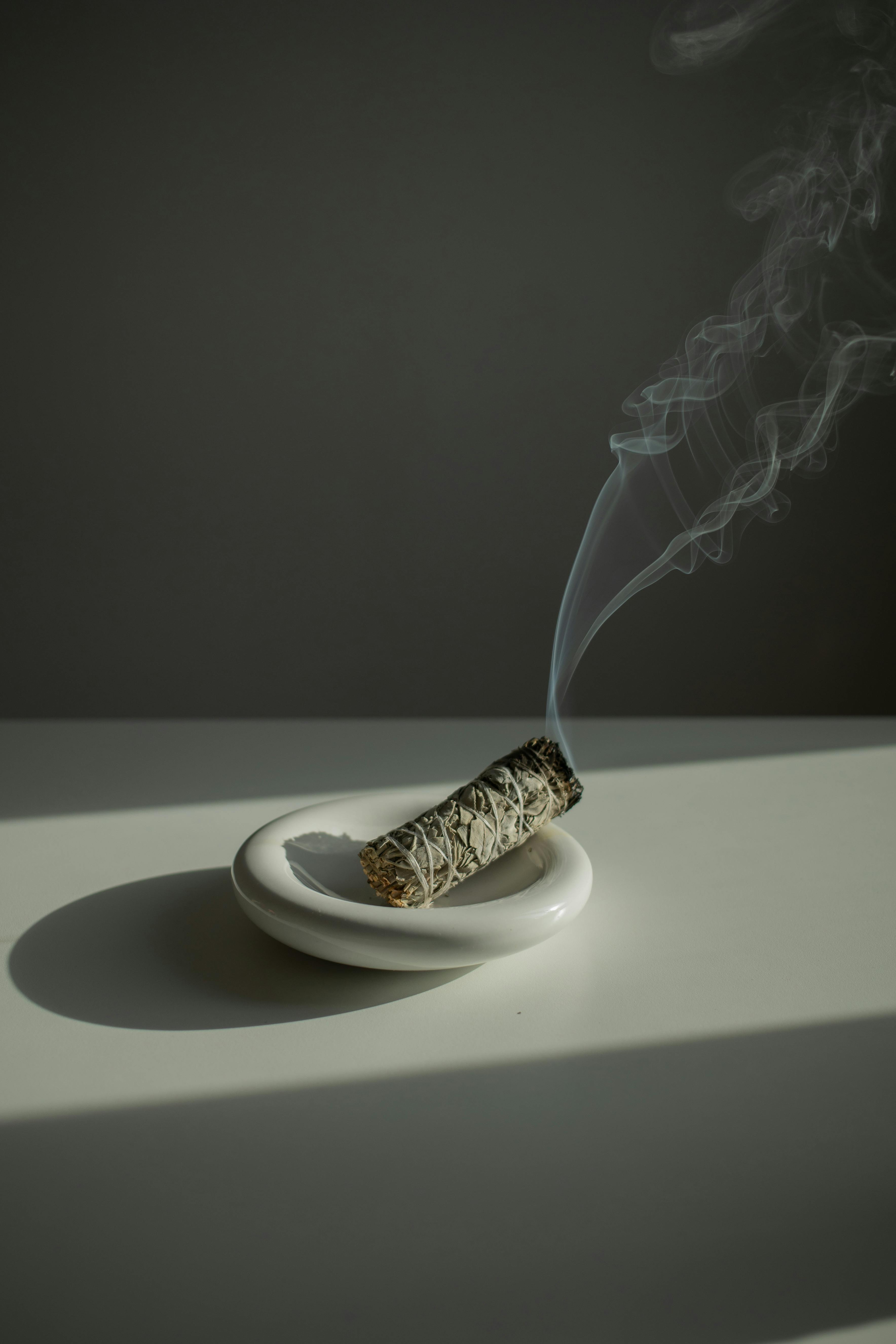 Sage smoke cleansing ritual to promote a calm, low-tox home.