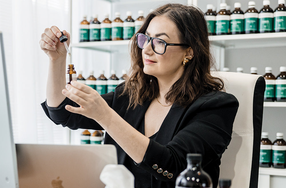 Jaime Chew carefully formulating natural remedies with a focus on  ingredients.