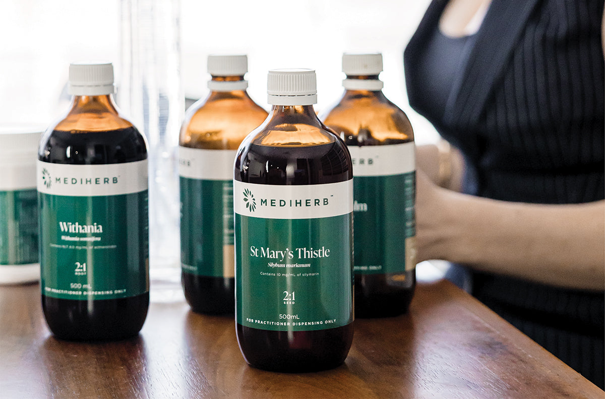 Various MediHerbs solutions displayed, highlighting a range of natural remedies tailored for holistic health and wellness by Nourishing Apothecary.