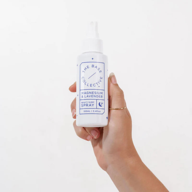 Natural sleep aid spray with magnesium and lavender to ease tension and improve sleep quality, packaged in a biodegradable bottle.